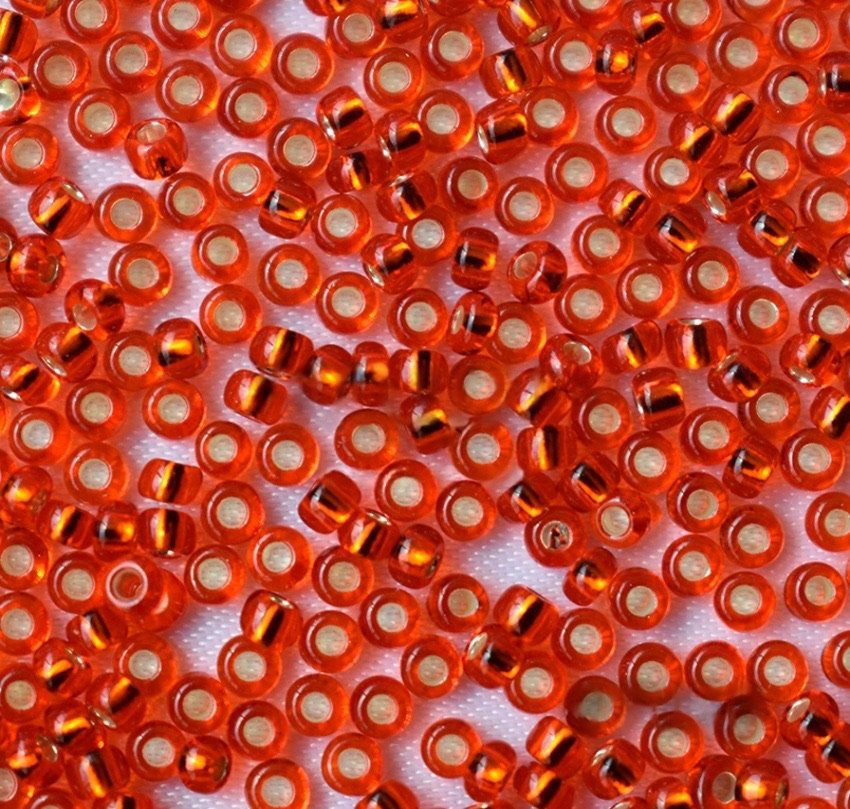 Preciosa Ornela Czech Glass Seed Beads 11/0 Silver Lined Orange (97050)
